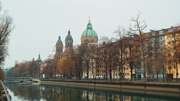 Left To Right Pan Real Time Shot of the Church of St. Luke, Located on the Banks of the River Isar