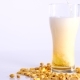 Beer Is Pouring Into Glass on White Background with Pickled Peanuts - VideoHive Item for Sale
