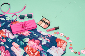 thes set, accessories, cosmetic. Floral dress,Trendy sunglasses, fashion handbag clutch, spring flowers. Summer lady. Creative urban. Perspective view