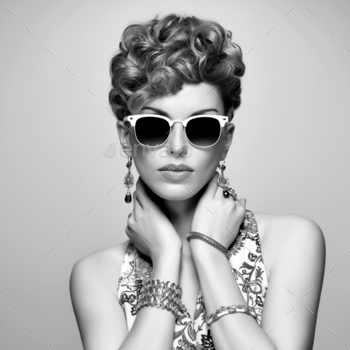 wk hairstyle,fashion Makeup. Beauty woman in Trendy Sunglasses, Glamour Lady,fashion pose. Playful Girl,Luxury summer Accessories.Black and white