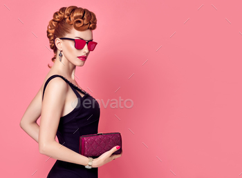 rstyle, fashion Sunglasses, Summer Party Disco Outfit. Beauty Redhead Woman in Trendy Luxury Accessories. Glamour fashion Lady. Playful Girl on Pink