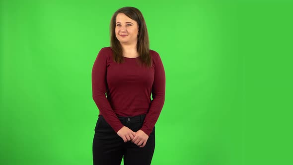 Pretty Girl Worrying in Expectation Then Smile and Proud of Herself. Green Screen