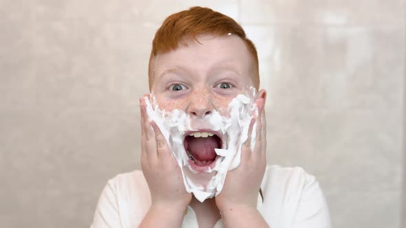 The Boy Smeared His Cheeks with Shaving Foam