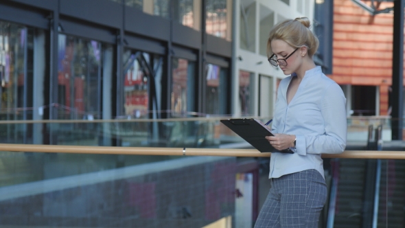 Beautiful Business Woman Writing