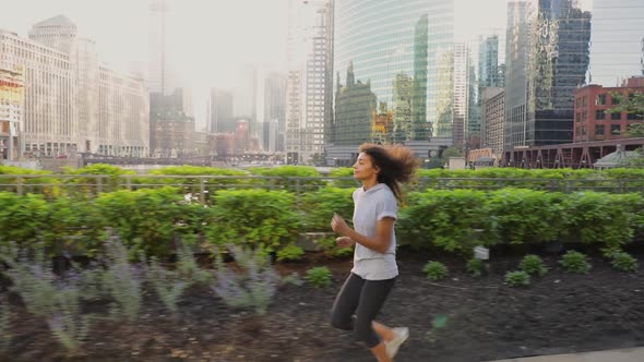 Attractive African American woman on her morning jog along the Chicago River