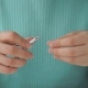 Woman Makes Herself Manicure with Tweezers - VideoHive Item for Sale
