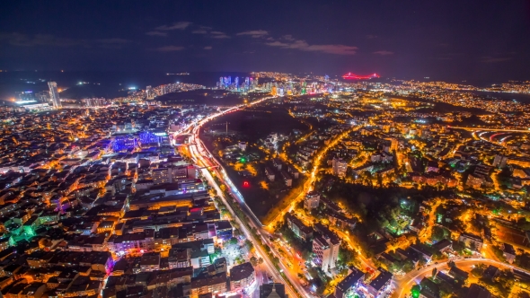 Rooftop View of Istanbul with Traffic Light at Night