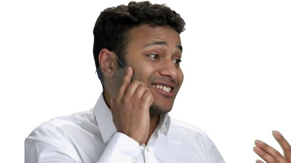 Excited Businessman Talking on Transparent Phone