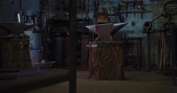 Craft Workshop of Blacksmith Anvil on Wooden Stand with Ancient Slavic Old Man Face  Prores