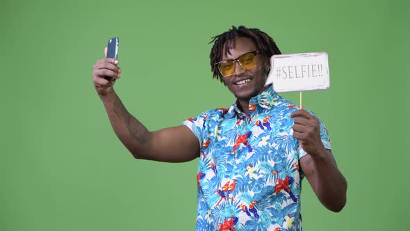 Young Handsome African Tourist Man Taking Selfie