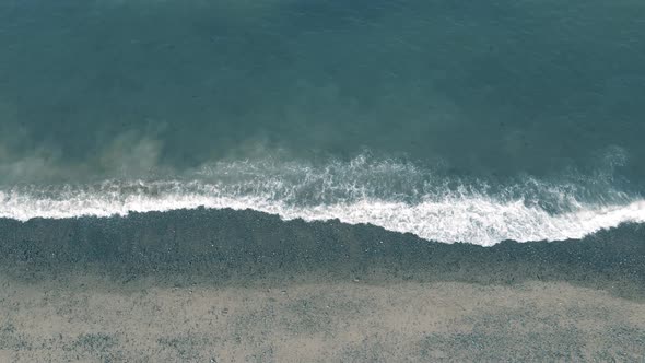 Ocean Waves Splashing On The Shore In Pebble Beach Near The Bray Town, Wicklow, Ireland. - aerial dr