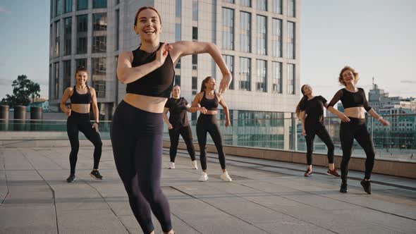 Girls Dancers Joyful Wearing Leggings and Tops Having Fun While Rehearsing Dance in Outside