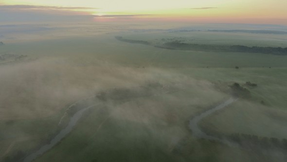 River Valley with Fog. Flight by Dron