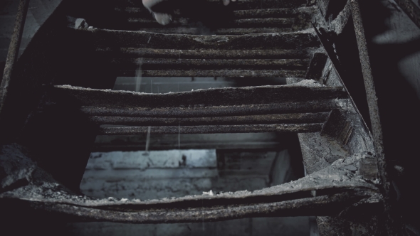 Prisoner in Chains Down the Stairs