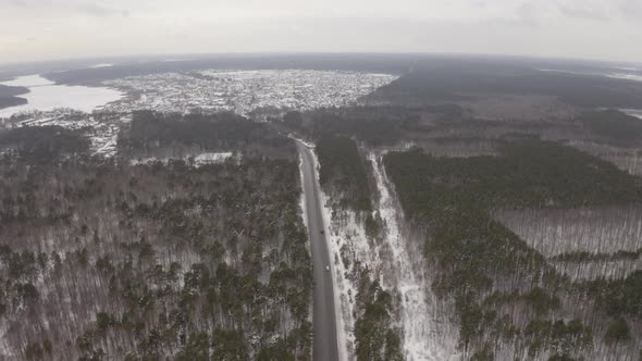 Aerial View The Road To A Small Winter Town