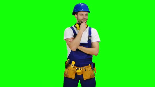 Builder Is Thinking How To Properly Draw a Sketch for Building a Building, Green Screen
