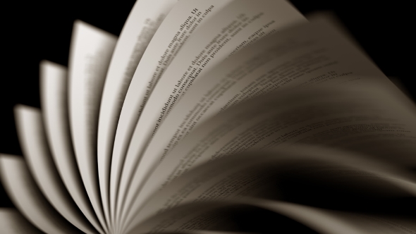 Slowly Turning Yellowed Pages of a Book alt