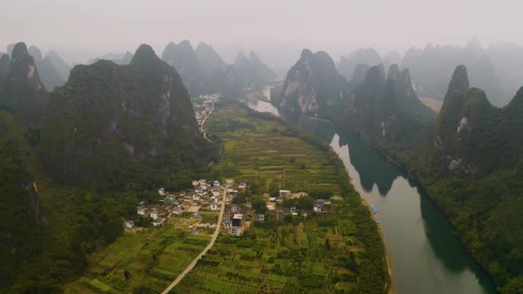 Aerial shot of the amazing rock formations along the Li River in China