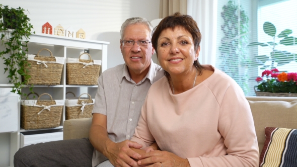 An Elderly Couple Communicates with Laptop Video Call