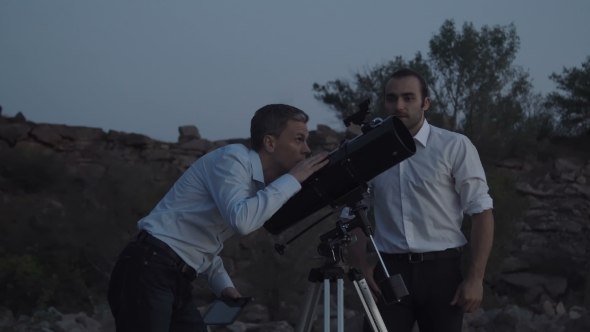 People Using Telescope alt