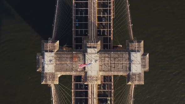 Aerial Top View of Brooklyn Bridge in New York, America. Drone Flying Over the East River and