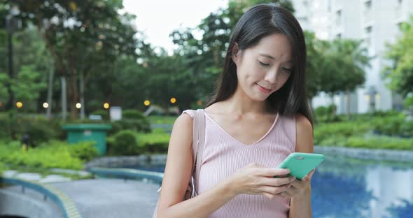 Woman Use of Cellphone in The Park