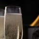 Champagne. Two Flutes with Bottle of Champagne in an Ice Bucket at Background. - VideoHive Item for Sale
