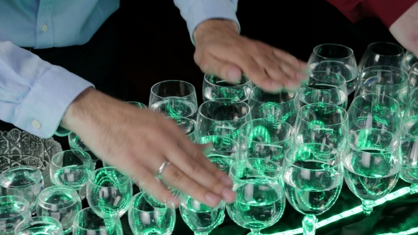 Musical Glasses. Musician Playing On Glass Harp