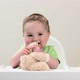 Baby boy sitting in highchair with teddy bear - VideoHive Item for Sale