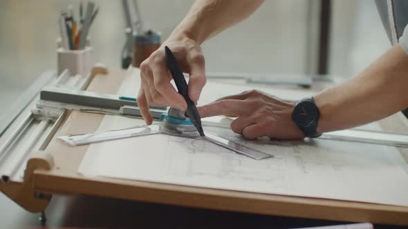 Architect's Desk Drawings Tape Measure Ruler and Other Drawing Tools