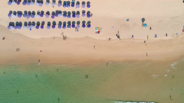 Aerial view drone camera of Beautiful tropical sea sandy beach and waves crashing against sand beach