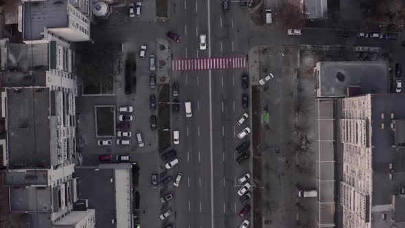 Top Down View of Busy City Traffic Late Evening Overhead Aerial Drone Flight