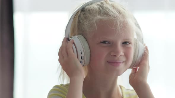 Portrait Beautiful Smiling Girl in Headphones