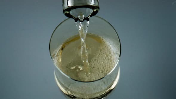 Closeup Bottle Pouring White Wine Into Goblet