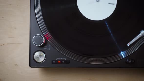 Black Modern Turntable with Rotating LP Record