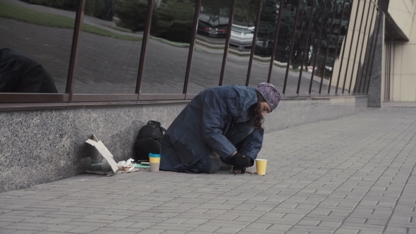 Beggar Picking Change.