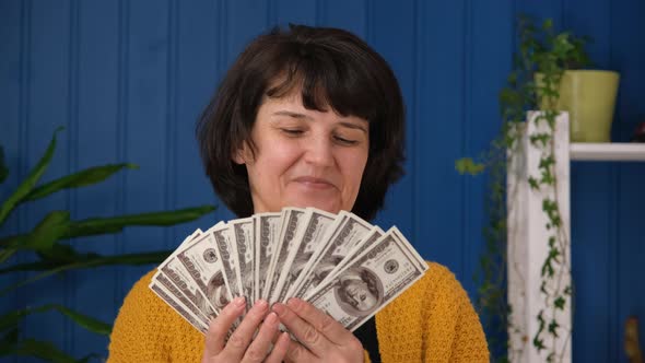 Middle Aged Woman Holding in Hands Money Cash Dollars