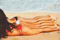 Girls Tanning at the Beach - PhotoDune Item for Sale
