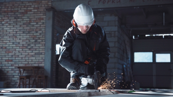 Man Cutting with Angle Grinder