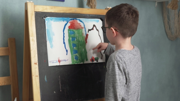 Child Shows His Drawing