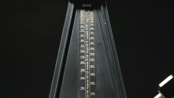 Vintage Metronome with Golden Pendulum