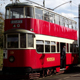 Vintage Electric Tram Departing
