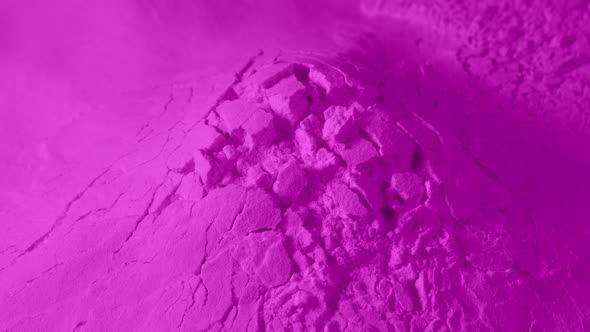 Crumbling Pink Powder Material Closeup Shot