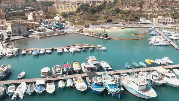 Aerial Shot Of Docked Boats In Mgarr Harbour Gozo Malta