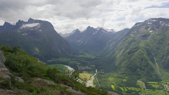 Rauma River At The Green Valley Of Romsdalen In Aandalsnes Town, More Og Romsdal County, Norway. sta