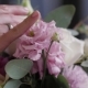 The Bride Is Holding a Wedding Bouquet in Her Hands, Fingering the Flowers - VideoHive Item for Sale
