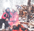 Couple near bonfire in winter landscape - PhotoDune Item for Sale