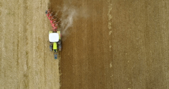 Farming - Tractor Plowing Field