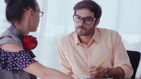 Creative Business People Group Having Conversation at Office Desk in Workplace