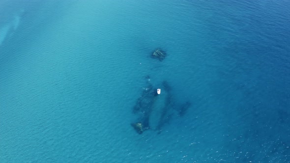 Aerial view of a ship wreck in the ocean